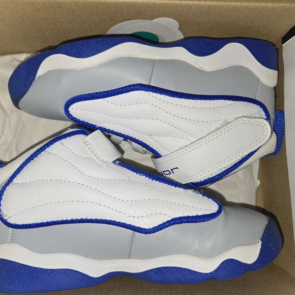White and Blue High-Top Jordan Sneakers
